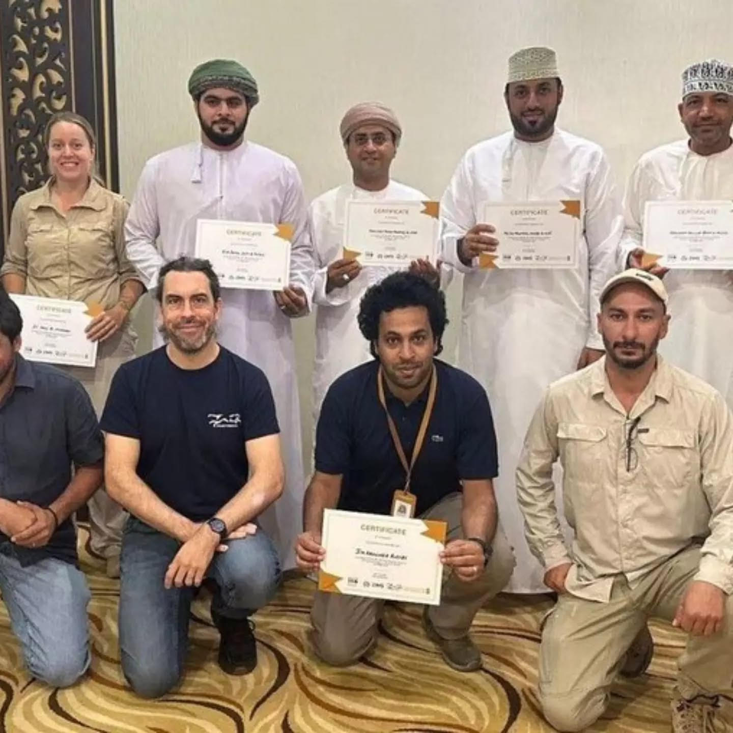 A group of professionals marking a training milestone